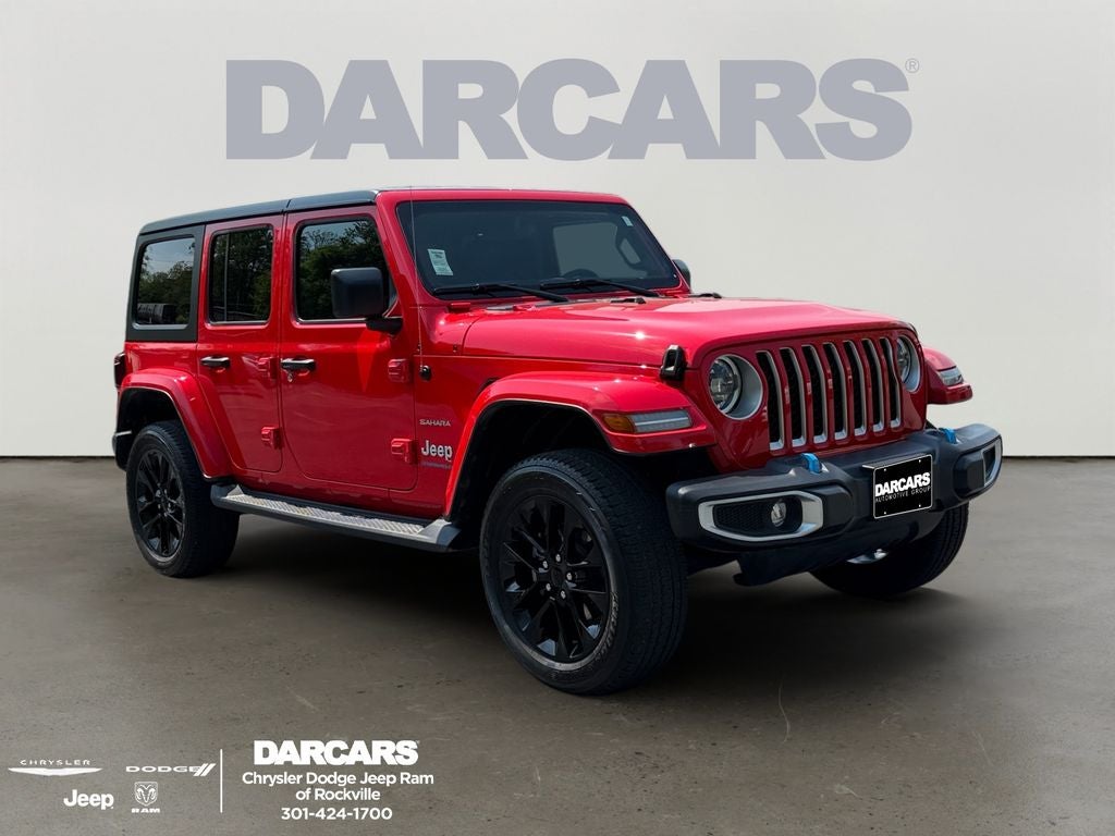 2023 Jeep Wrangler Sahara 4xe in Firecracker Red Clearcoat — front three-quarter view