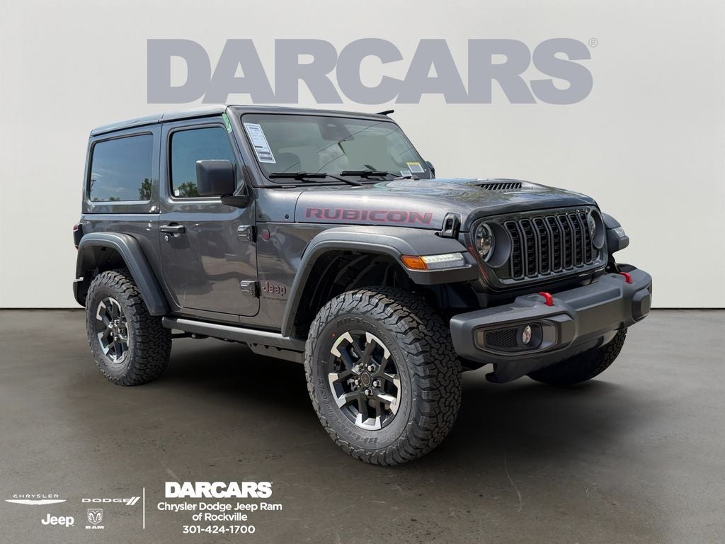 2026 Jeep Wrangler Rubicon in Granite Crystal Metallic Clear-Coat Exterior Paint — front three-quarter view