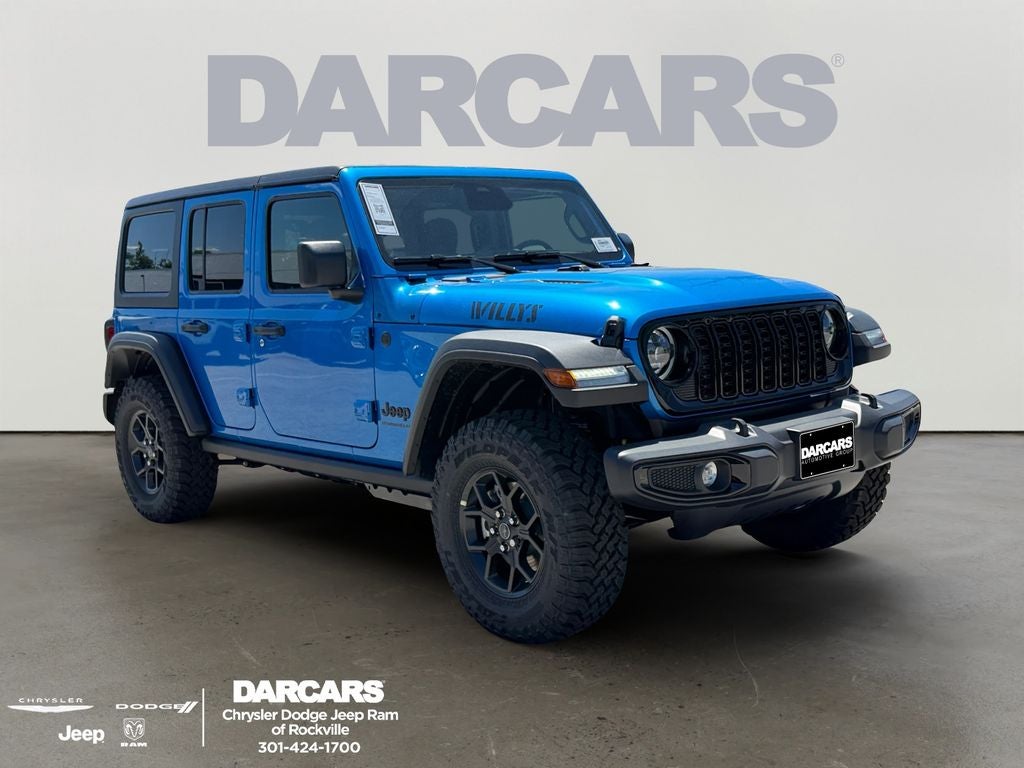 2026 Jeep Wrangler Willys in Hydro Blue Pearl-Coat Exterior Paint — front three-quarter view