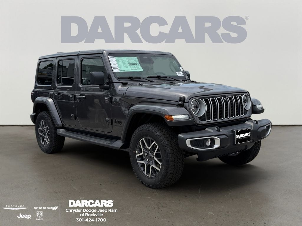 2026 Jeep Wrangler Sahara in Granite Crystal Metallic Clear-Coat Exterior Paint — front three-quarter view