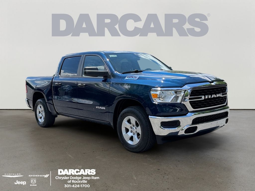 2024 RAM 1500 Big Horn/Lone Star in Patriot Blue Pearlcoat — front three-quarter view