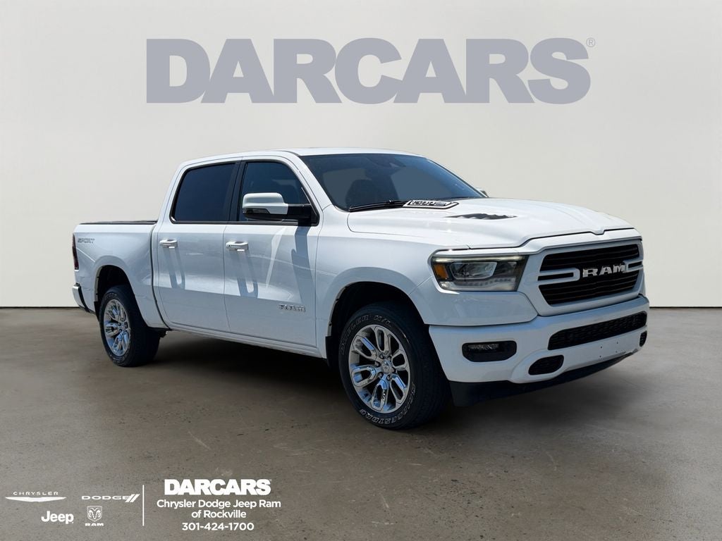 2023 RAM 1500 Laramie in Bright White Clearcoat — front three-quarter view