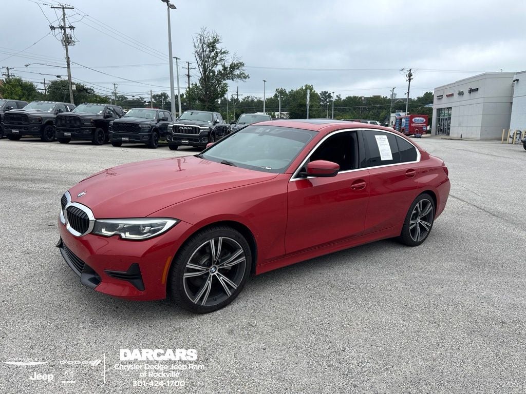 2020 BMW 3 Series 330i xDrive in Melbourne Red Metallic — front three-quarter view