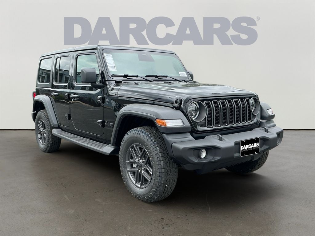 2026 Jeep Wrangler Sport S in Black Clear-Coat Exterior Paint — front three-quarter view